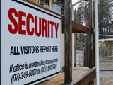 Security office with sign in foreground