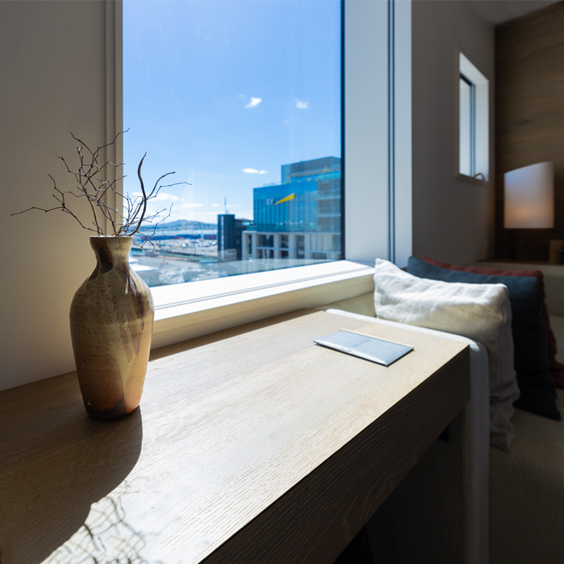 View out through a window of The Hotel Britomart with Rangitoto Island in the background