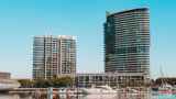 Looking across the Yarra River in Melbourne's Docklands district towards Yarra's Edge towers 2 & 3.