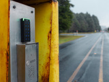 Access reader with street in background