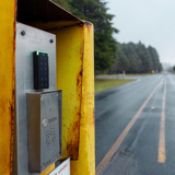 Access reader with street in background