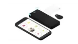 Image of a mobile phone, ICT card reader, access card and tag